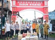 Bentuk Kepedulian,Kapolres Gresik Salurkan Bantuan Sosial bagi Warga Terdampak Banjir di Benjeng