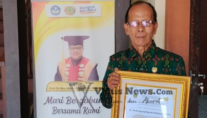 Atas 38 Tahun Pengabdian di UPMI Bali, Ngurah Adhiputra Terima Piagam Penghargaan Purna Bakti